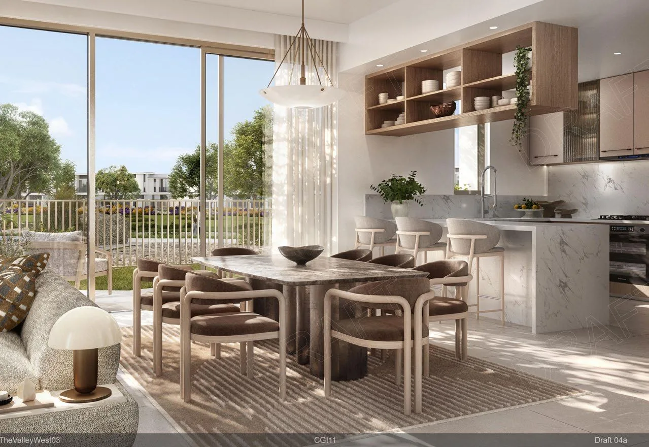 Dining room and open kitchen at Vindera at The Valley by Emaar